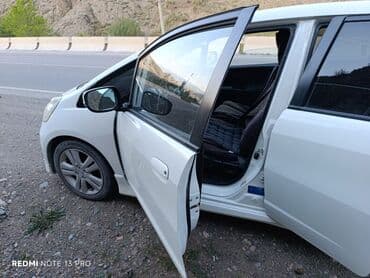 обмен дом на авто: Белый пятидверный хэтчбек Honda Jazz, идеально подходящий для — 13