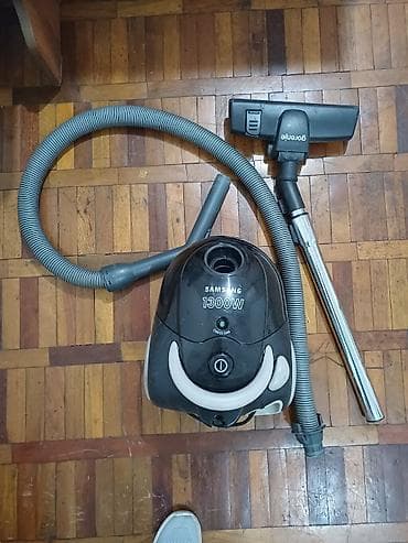 Пылесос Samsung 1300W с мешковым сбором пыли. Особенности: - Мощность