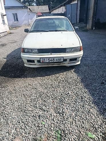 Mitsubishi Lancer: 1990 г., 1.5 л, Механика, Бензин, Седан