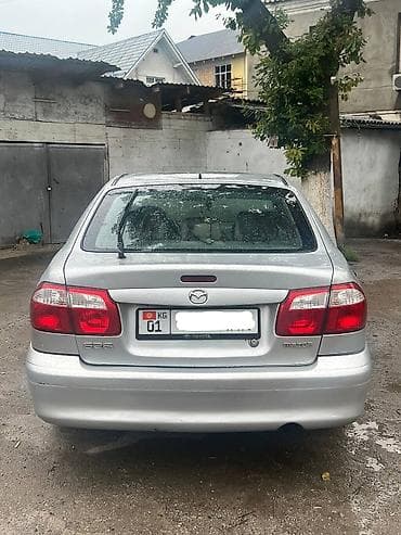 мазда каппелла: Mazda Capella: 2000 г., 1.8 л, Механика, Бензин, Хэтчбэк — 9
