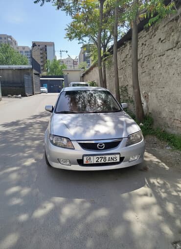 Mazda 323: 2003 г., 2 л, Механика, Дизель, Универсал