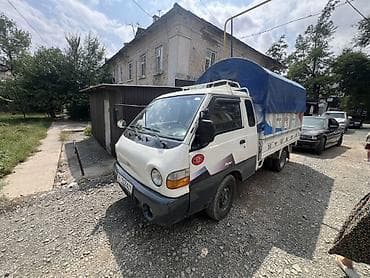 ручной машина: Hyundai Porter — компактный бортовой грузовик с тентованным кузовом — 6