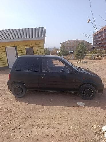 тонерофка на авто: Daihatsu Mira: 1991 г., Механика, Бензин, Хэтчбэк — 3