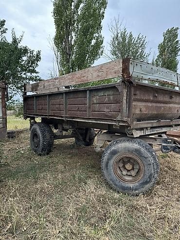 Прицеп тракторный двухосный, бортовой. - Конструкция: рама на