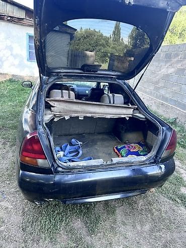 л300 делика: Mitsubishi Carisma: 1998 г., 1.8 л, Механика, Бензин, Седан — 7