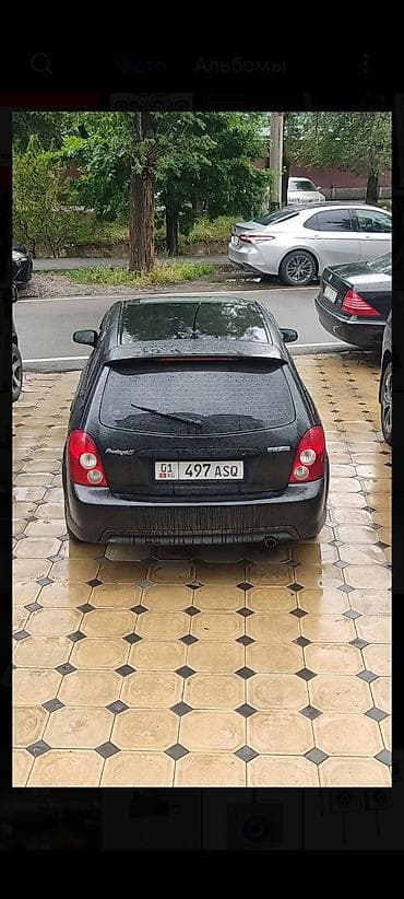 mazda 2: Mazda Familia: 2002 г., 2 л, Автомат, Бензин, Универсал — 6