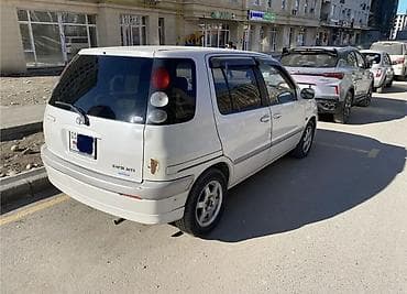 задний фонарь ауди: Toyota Raum: 2003 г. — 6