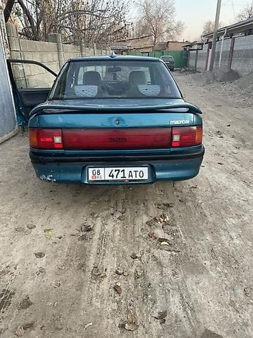 фары на опель вектра б: Mazda 323: 1991 г., Седан — 3