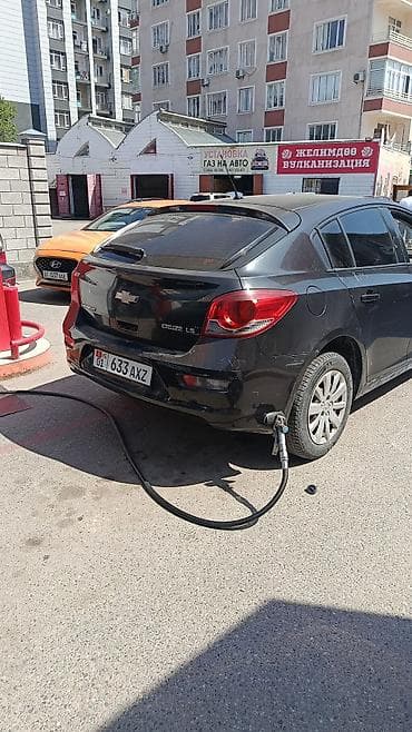 Chevrolet Cruze: 2012 г., 1.6 л, Автомат, Газ, Хэтчбэк