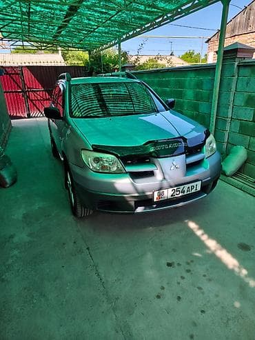lancer evolution: Mitsubishi Outlander: 2003 г., 2 л, Механика, Бензин, Кроссовер — 1