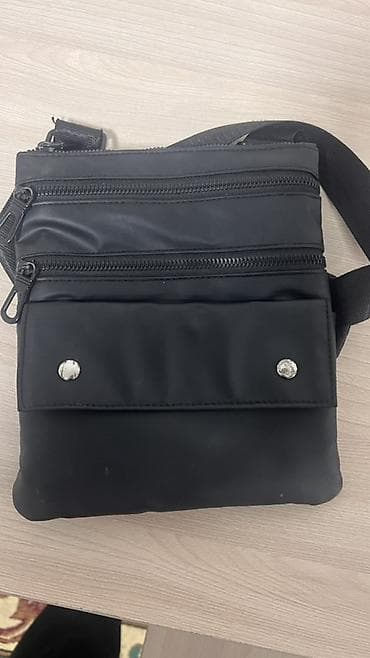 Другие сумки: Сумка через плечо, компактная и легкая, черного цвета. - Формат — 1