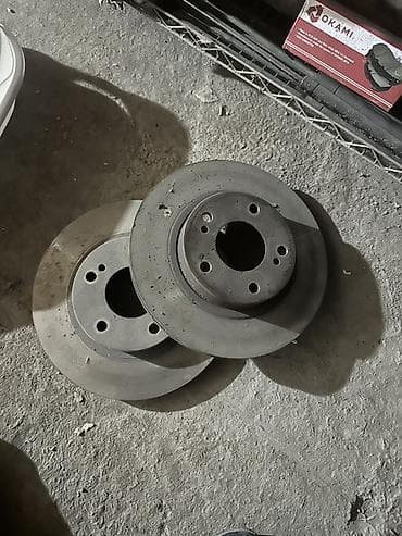 Предний тормозной диск Nissan 2002 г., Б/у, Оригинал