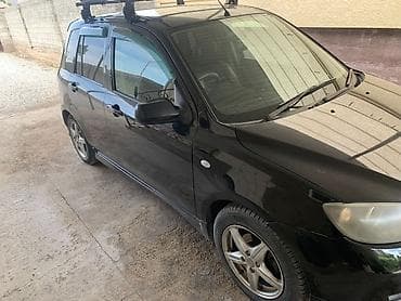 2 8: Mazda Demio: 2004 г., Хэтчбэк — 2