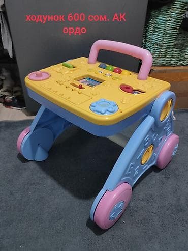 алфа: Детский ходунок-каталка с развивающей панелью. Особенности: - — 1