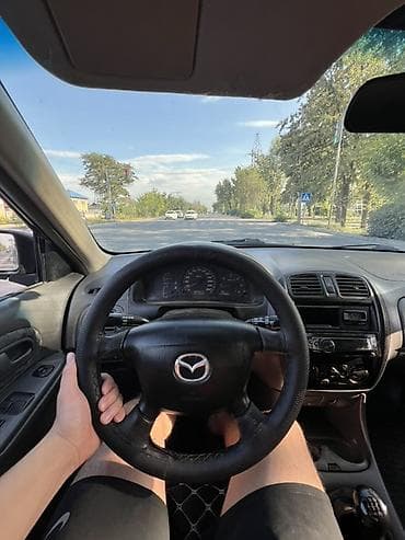 мереке авто слиф: Mazda 323: 1999 г., 1.5 л, Механика, Бензин, Универсал — 10