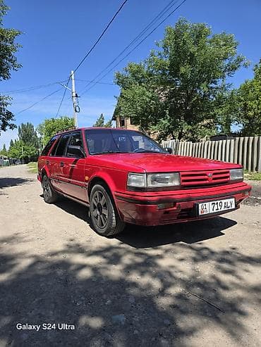 Datsun: Nissan Bluebird: 1988 г., 2 л, Механика, Бензин, Универсал — 1
