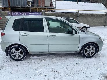 Mazda 2: 2003 г.