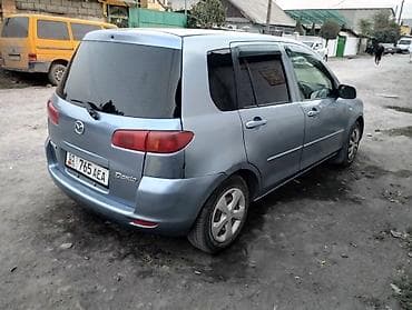Mazda Demio: 2003 г. — 4