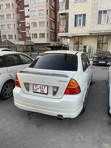 subaru forester2000: Suzuki Aerio: 2004 г., 1.8 л, Автомат, Бензин — 5