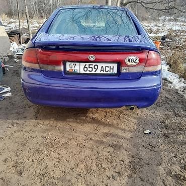 Mazda: Mazda 626: 1995 г., 1.8 л, Механика, Бензин, Хэтчбэк — 2