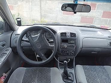 launch pro elite: Mazda Protege: 1998 г., 1.6 л, Механика, Бензин, Хэтчбэк — 6