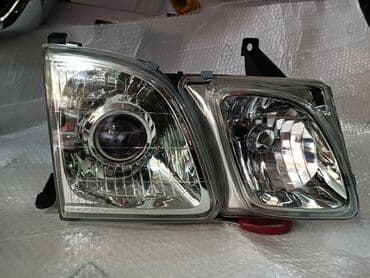Передние фары : lx-470. 2003-07 год. Рестайлинг. 
Товар в наличии