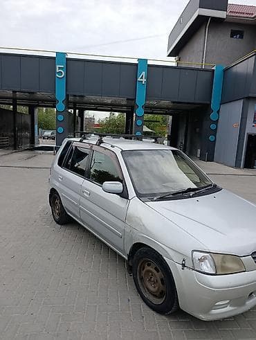 Транспорт: Mazda Demio: 2001 г., 1.3 л, Автомат, Бензин, Хэтчбэк — 1