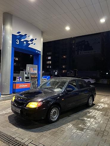 лампа керосиновая: Седан черного цвета, компактный и экономичный. Кузов 4-дверный — 6