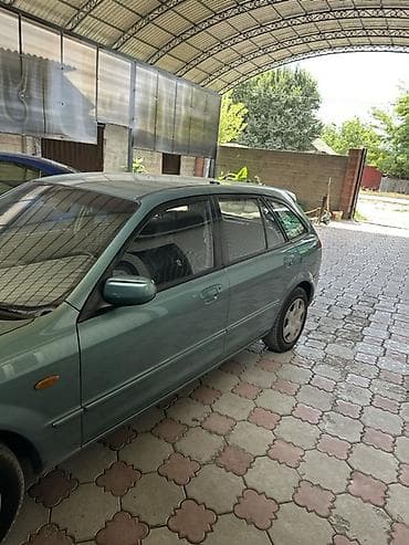 радар авто: Mazda 323: 2001 г., 1.6 л, Автомат, Бензин, Универсал — 3