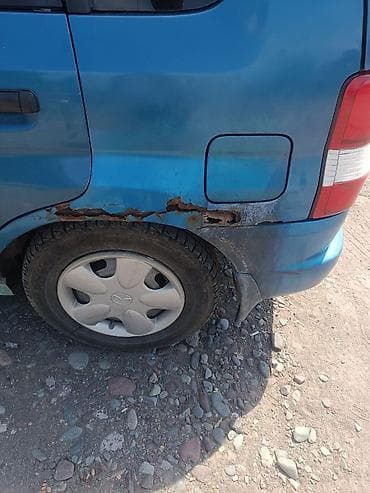 отдам не дорого: Mazda Demio: 1999 г., 1.3 л, Механика, Бензин, Хэтчбэк — 3