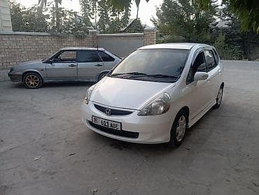 скутер электр: Honda Fit: 2005 г., 1.5 л, Автомат, Бензин, Хэтчбэк — 3