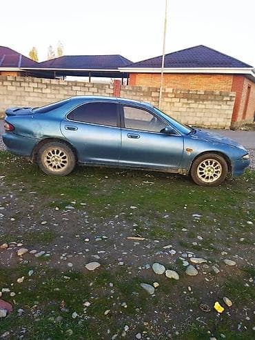 bmw 518: Mazda 6: 1992 г., 1.9 л, Механика, Бензин, Седан — 1