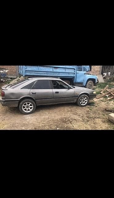 Mazda 626: 1989 г., Кол менен иштөөчү, Бензин, Хетчбек — 2