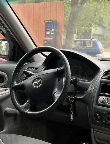 sky way: Mazda 323: 2002 г., 1.3 л, Механика, Бензин, Универсал — 7