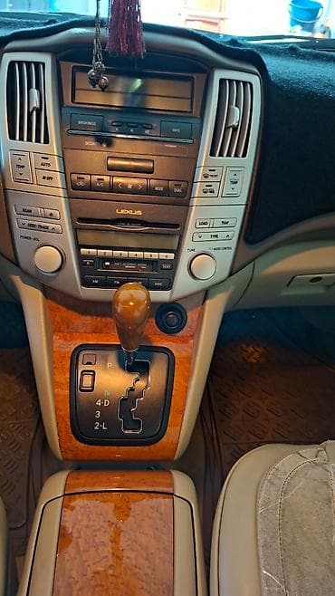 ef m: Lexus RX — интерьер премиального кроссовера - Салон: бежево‑серый — 4