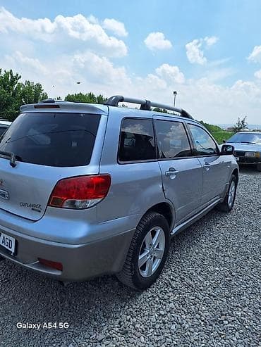 highlander platinum: Mitsubishi Outlander: 2004 г., Кроссовер — 1