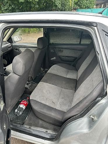 Унаа: Daewoo Nexia: 2011 г., 1.6 л, Кол менен иштөөчү, Бензин, Седан — 10