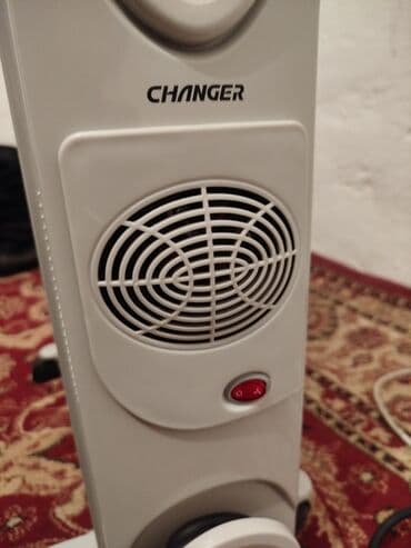 всвязи с переездом: Масляный обогреватель Кол-во секций: 10 и более, Отключение при перегреве, Отключение при падении, Встроенный вентилятор — 1