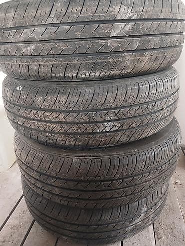 175 70 р14: Комплект автомобильных шин 165/65 R14 79T. Характеристики: - Размер — 2