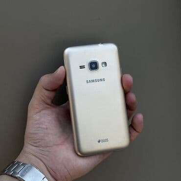 самсунк ж5: Samsung Galaxy J1 2016, Колдонулган, түсү - Алтын, 2 SIM — 1