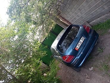 bmv e60: Nissan Almera: 2001 г., 1.5 л, Хэтчбэк — 5