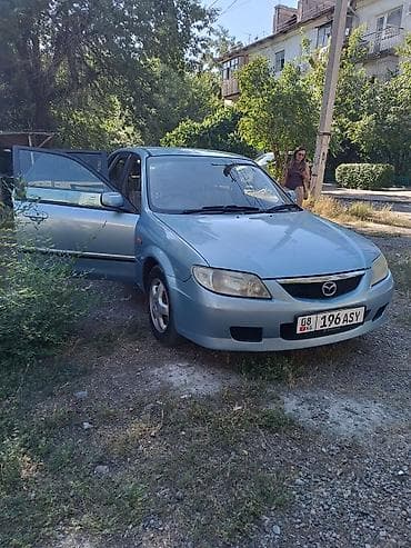 mazda 121: Mazda Familia: 2002 г., 1.5 л, Автомат, Бензин, Универсал — 1