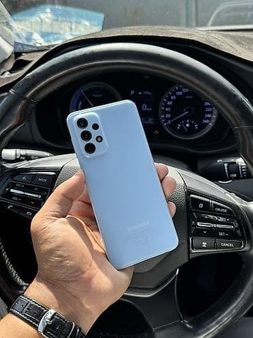 самсунг 33: Samsung Galaxy A23, Б/у, 128 ГБ, цвет - Голубой, 2 SIM — 1