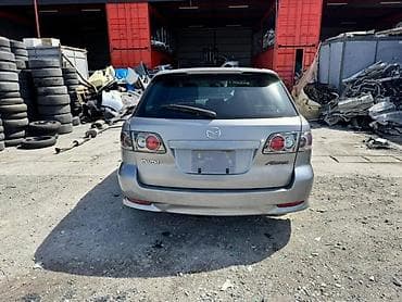 mazda универсал: Крышка багажника Mazda, 2002 г., Б/у, Оригинал — 1