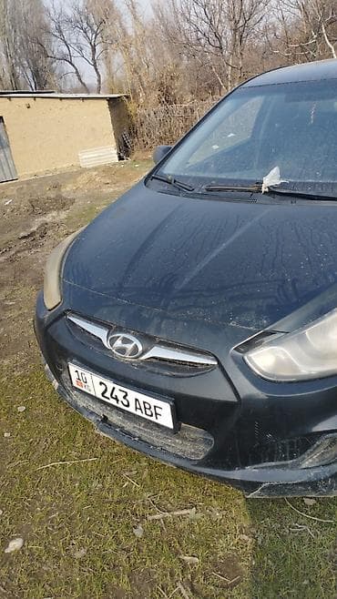 Унаа: Hyundai Solaris: 2011 г., 1.4 л, Кол менен иштөөчү, Бензин, Хетчбек — 5