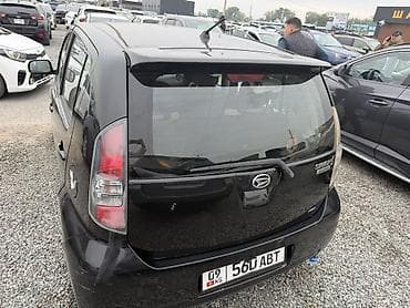 обмен на 5 5: Daihatsu Sirion: 2009 г., 1.2 л, Автомат, Бензин — 3