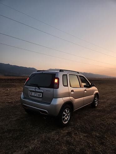 Унаа сатуу: Suzuki Ignis: 2002 г., 1.3 л, Кол менен иштөөчү, Бензин, Хетчбек — 4