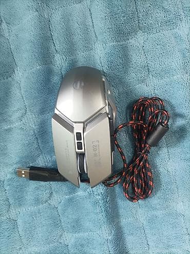 mx 4: Игровая проводная мышь с футуристичным корпусом - Подключение: USB — 1