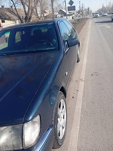 53 кузов: Легковой автомобиль седан, тёмно‑синего цвета. Основные особенности — 1