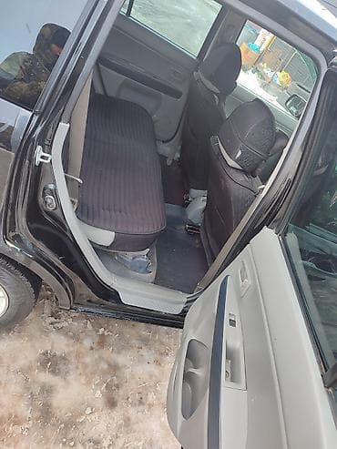 сливной механизм: Mazda Demio: 2003 г., 1.3 л, Автомат, Бензин, Хэтчбэк — 5